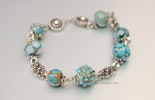 "Ibiza"Armband aus Mini-Muranoglasperlen türkis/Elfenbeinfarbig und Silberschmuck (Silber 925) schmückt jetzt Sarah/Basel
 "Ibiza"Armband aus Mini-Muranoglasperlen türkis/Elfenbeinfarbig und Silberschmuck (Silber 925) schmückt jetzt Sarah/Basel