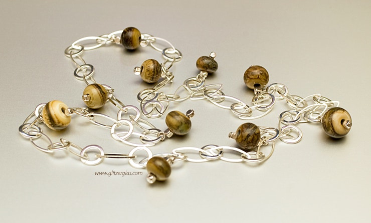 "Rocky" Modeschmuckkette mit 10 Muranoglasperlen CHF 60.- "Rocky" Modeschmuckkette mit 10 Muranoglasperlen CHF 60.-
