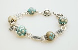 "Ibiza 2"Armband aus Mini-Muranoglasperlen türkis/Elfenbeinfarbig und Silberschmuck (Silber 925). 
Vergeben an Brigitte in Palermo/Italien "Ibiza 2"Armband aus Mini-Muranoglasperlen türkis/Elfenbeinfarbig und Silberschmuck (Silber 925). 
Vergeben an Brigitte in Palermo/Italien