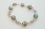 "Ibiza 3"Armband aus Mini-Muranoglasperlen türkis/Elfenbeinfarbig und Silberschmuck (Silber 925). Verkauft. "Ibiza 3"Armband aus Mini-Muranoglasperlen türkis/Elfenbeinfarbig und Silberschmuck (Silber 925). Verkauft.