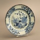 Plate Jingdezhen porcelain, ca. 1750, 22.5x2cm, brown rim, underglaze blue chrysantemum decoration.