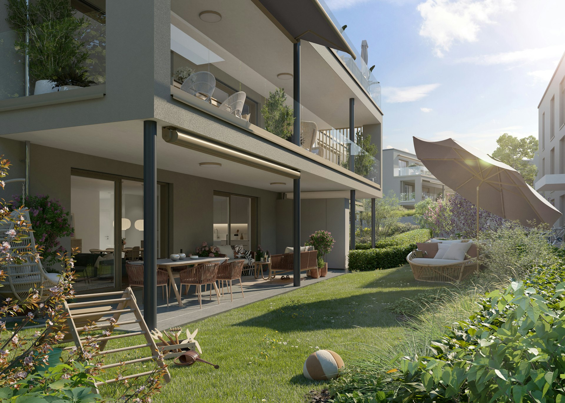 Wohnen mit Ferienstimmung. Das Bild zeigt die Terrasse und den privaten Garten der Wohnung C1-1.1. Wohnen mit Ferienstimmung. Das Bild zeigt die Terrasse und den privaten Garten der Wohnung C1-1.1.